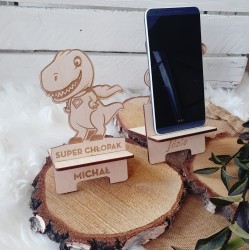 Drewniany stojak na telefon dinozaur